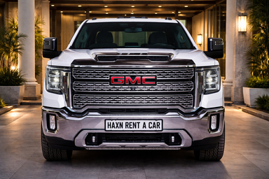 GMC Denali 2025 White for Rent with Driver in Islamabad, Rawalpindi, Lahore